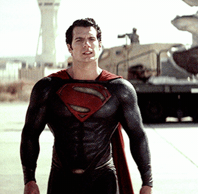 Man In Black And Red Superman Costume GIF
