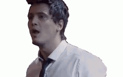 Man In Black And White Blow Air GIF