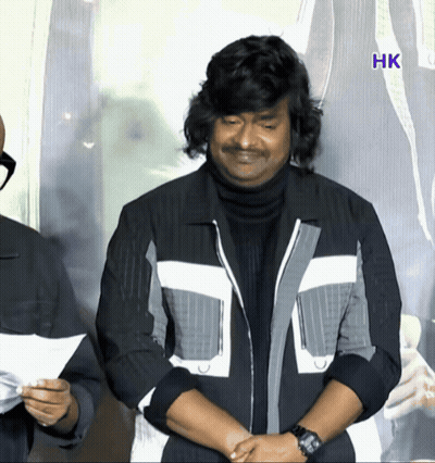 Man In Black And White Jacket Before HK Sign GIF