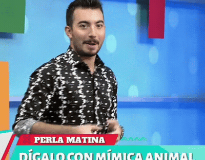 Man In Black And White Shirt In Front Of Perla Matina Sign GIF