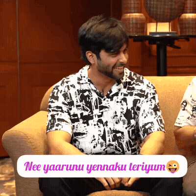 Man In Black And White Shirt Sitting On Couch With Nee Yaaru Sticker GIF