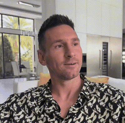 Man In Black And White Shirt Sitting On Couch GIF