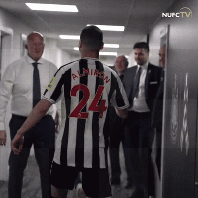 Man In Black And White Striped Jersey Number 24 GIF