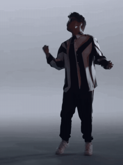 Man In Black And White Striped Shirt Dancing GIF