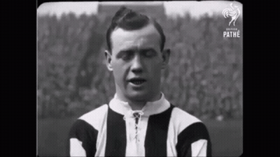 Man In Black And White Striped Shirt GIF