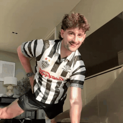 Man In Black And White Striped Umbro Shirt GIF