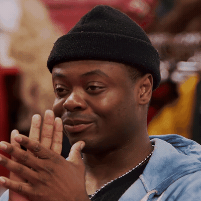 Man In Black Beanie And Blue Shirt Clapping GIF