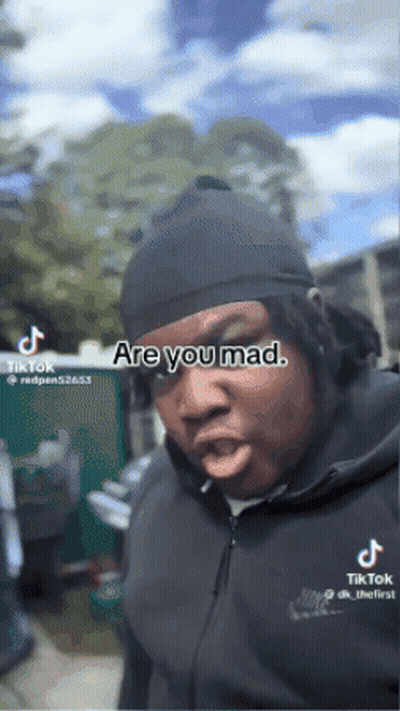 Man In Black Beanie And Jacket Says Are You Mad GIF