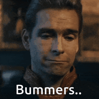 Man In Black Beanie And Plaid Shirt In Red Car GIF