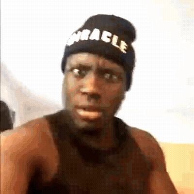 Man In Black Beanie And Tank Top Making Funny Face GIF