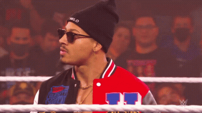 Man In Black Beanie And Varsity Jacket Number 11 GIF