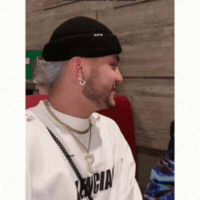Man In Black Beanie And White Shirt Saying Encia GIF