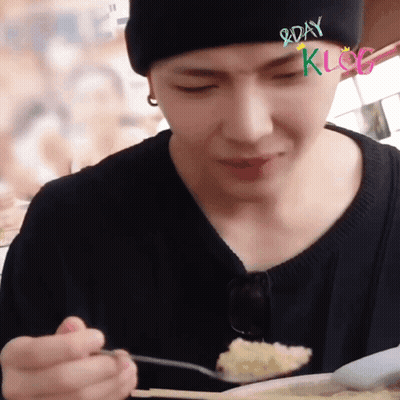 Man In Black Beanie Eating With Spoon GIF