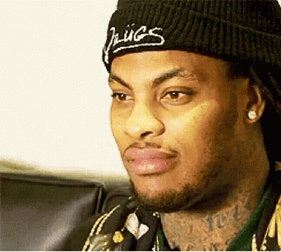 Man In Black Beanie With Juices GIF