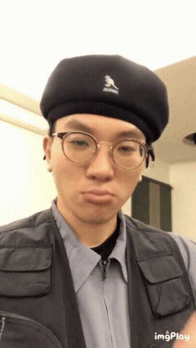 Man In Black Beret And Glasses Making Face GIF
