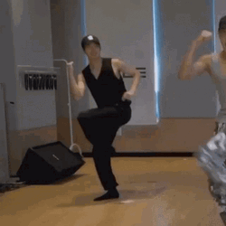 Man In Black Breakdancing GIF