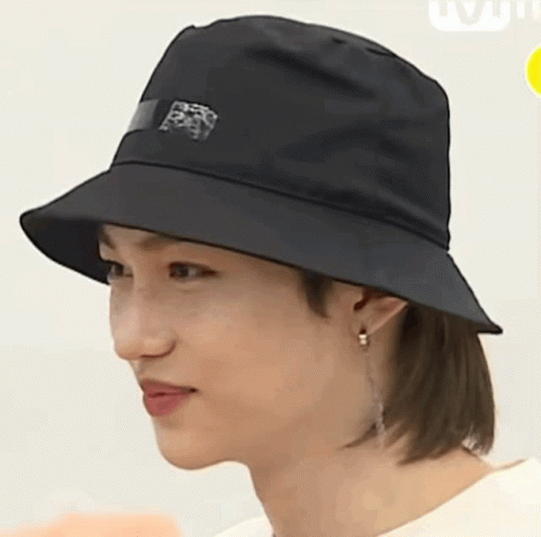 Man In Black Bucket Hat With Sticker GIF