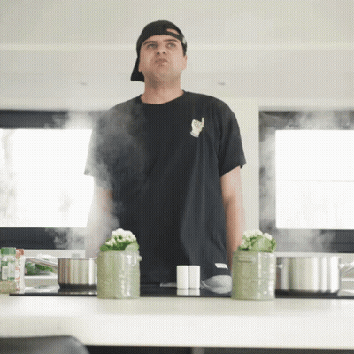 Man In Black Cat T-Shirt In Kitchen GIF