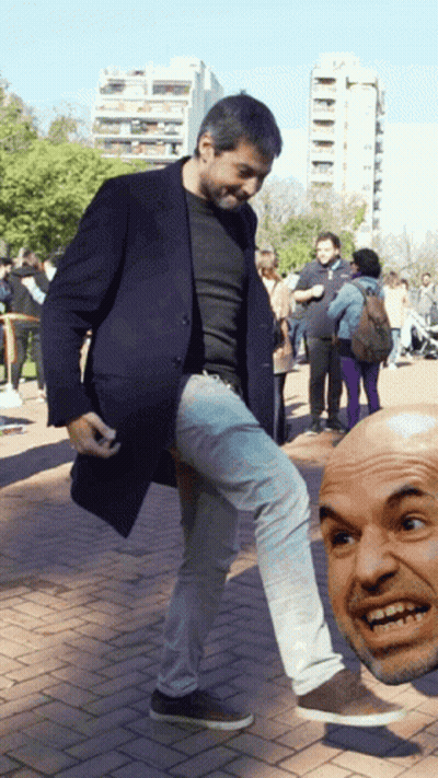 Man In Black Coat Kicks Another Man's Head GIF