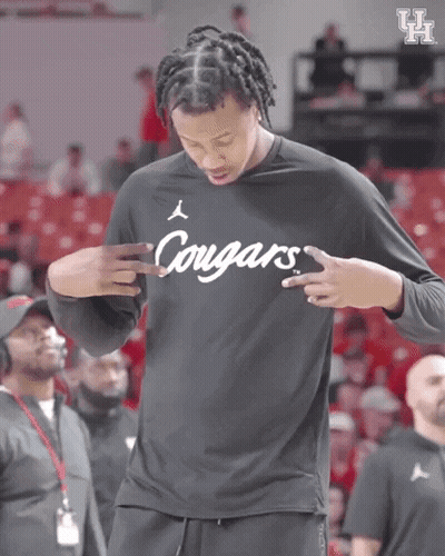 Man In Black Cougars Shirt On Basketball Court GIF