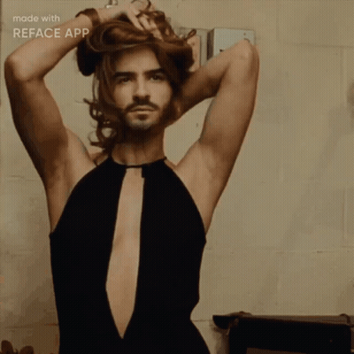 Man In Black Dress With Plunging Neckline Reface App GIF