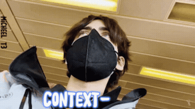 Man In Black Face Mask With Context GIF