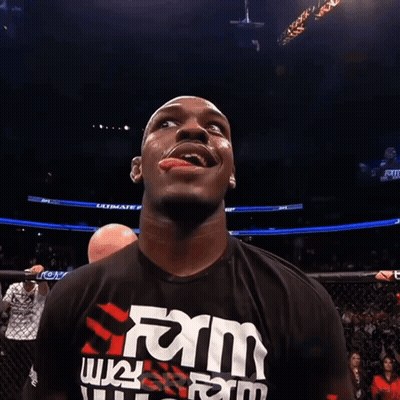 Man In Black Farm Shirt Sticking Tongue GIF