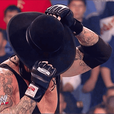 Man In Black Hat And Boxing Gloves GIF
