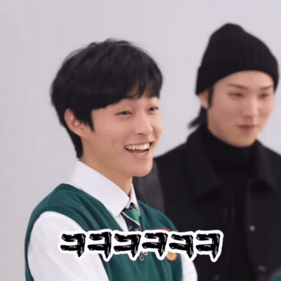Man In Black Hat And Green Vest Saying Eeeeee GIF