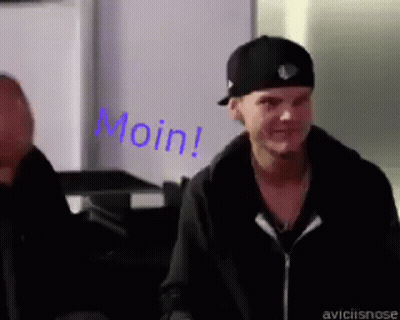 Man In Black Hat And Jacket Saying Moin GIF