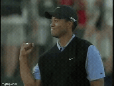 Man In Black Hat And Nike Vest Raising Fist GIF