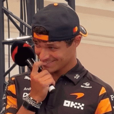 Man In Black Hat And Orange Shirt With DHX GIF