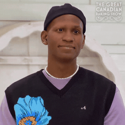 Man In Black Hat And Purple Shirt With Great Canadian Baking Show GIF