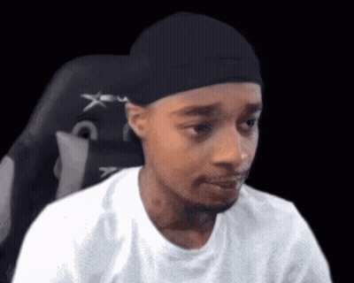 Man In Black Hat And White Shirt Sitting GIF