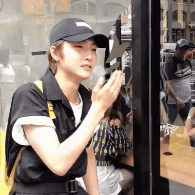 Man In Black Hat At McDonald's Window GIF