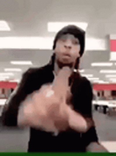 Man In Black Hat Giving Middle Finger GIF