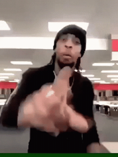 Man In Black Hat Giving Middle Finger GIF