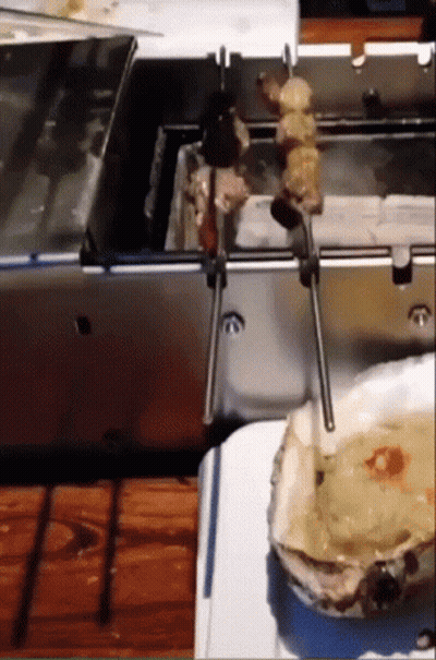 Man In Black Hat Holding Food GIF