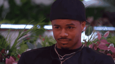 Man In Black Hat Looking At Woman GIF