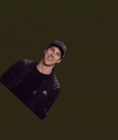 Man In Black Hat Pointing At Wiki Yadav Button GIF