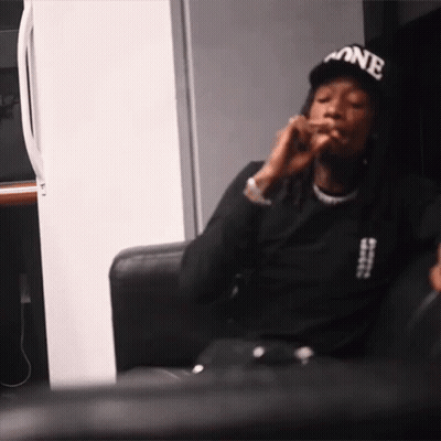 Man In Black Hat Saying One Smoking Cigarette GIF