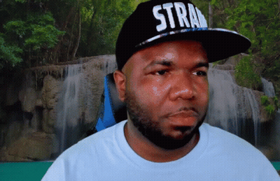 Man In Black Hat Saying Stray GIF