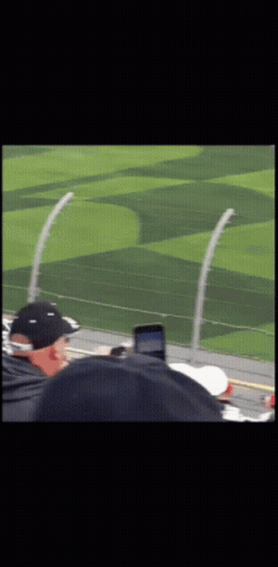 Man In Black Hat Watching Race GIF