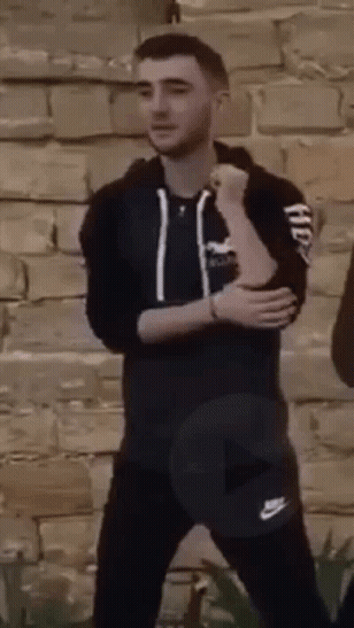 Man In Black Hoodie And Pants Arms Crossed GIF
