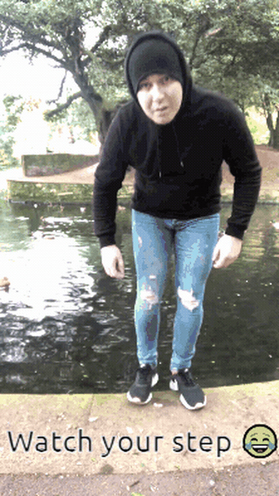 Man In Black Hoodie And Ripped Jeans GIF