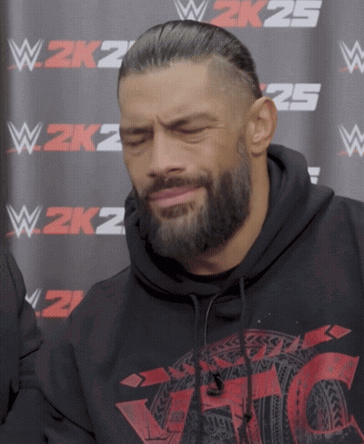 Man In Black Hoodie In Front Of W2K25 Sign GIF