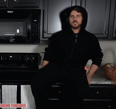 Man In Black Hoodie In Front Of Whirlpool Oven GIF