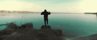 Man In Black Hoodie Overlooking Water GIF