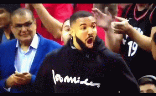 Man In Black Hoodie Saying Love In Crowd GIF