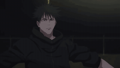 Man in Black Hoodie Standing in Dark With Arms Outstretched